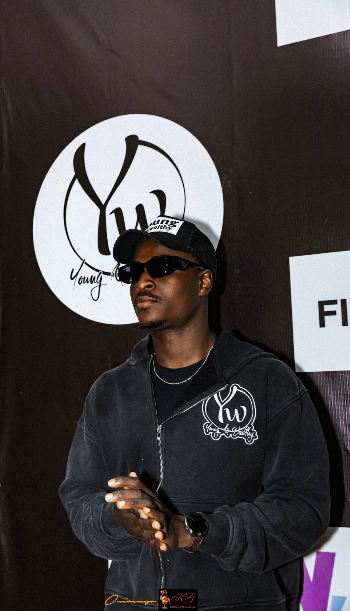 Young & Wealthy hat community event photo